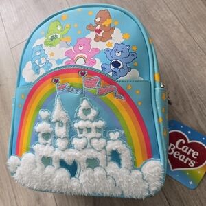 NWT Care Bears Rainbow & White Cloud Kingdom Small Blue Backpack
